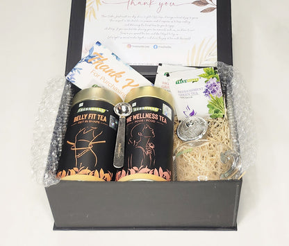 She Wellness Tea And Belly Fit Tea gift box with((Spoon, Stainer, Cup))